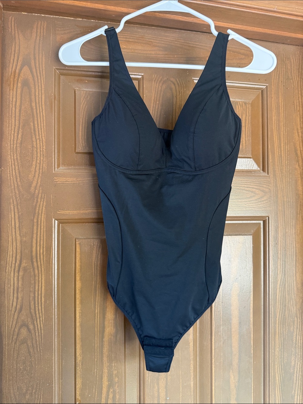 Minimal Black One-Piece Bodysuit with Adjustable Straps